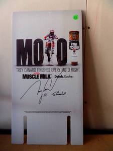 lot 112 image: TREY CANARD AUTOGRAPHED MOTORCROSS ADVERTISEMENT BOARD