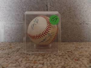 lot 159 image: OFFICIAL RAWLINGS BASEBALL - UNIDENTIFIED SIGNATURES IN DISPLAY CUBE