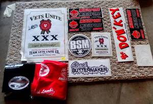 lot 206 image: ASSORTED RACING DECALS AND SURVIVOR BUFFS