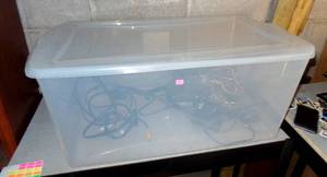 lot 311 image: LARGE PLASTIC SNAP TOTE AND LID WITH ELECTRONICS AS SHOWN