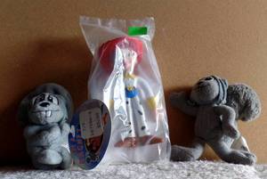 lot 345 image: cOLLECTORS LOT OF (2) ROCKY FIGURES AND TOY STORY SEALED FIGURE