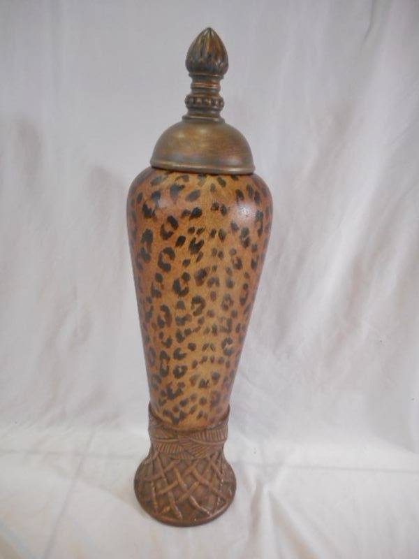 lot 92 image: Leopard print urn with lid