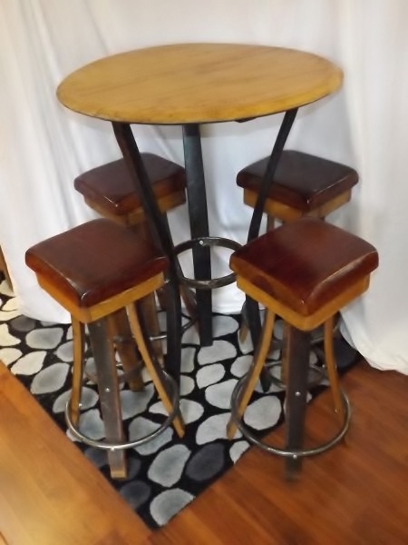 lot 7 image: Wine barrel table with matching stools (4)