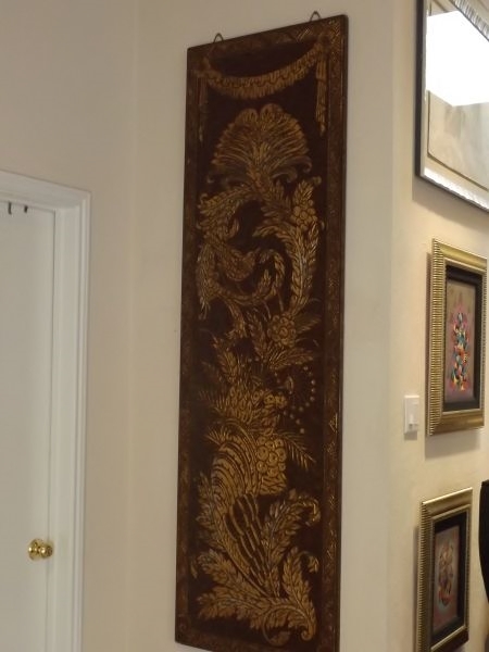 lot 14 image: Wood wall panel with decorative peacock motif