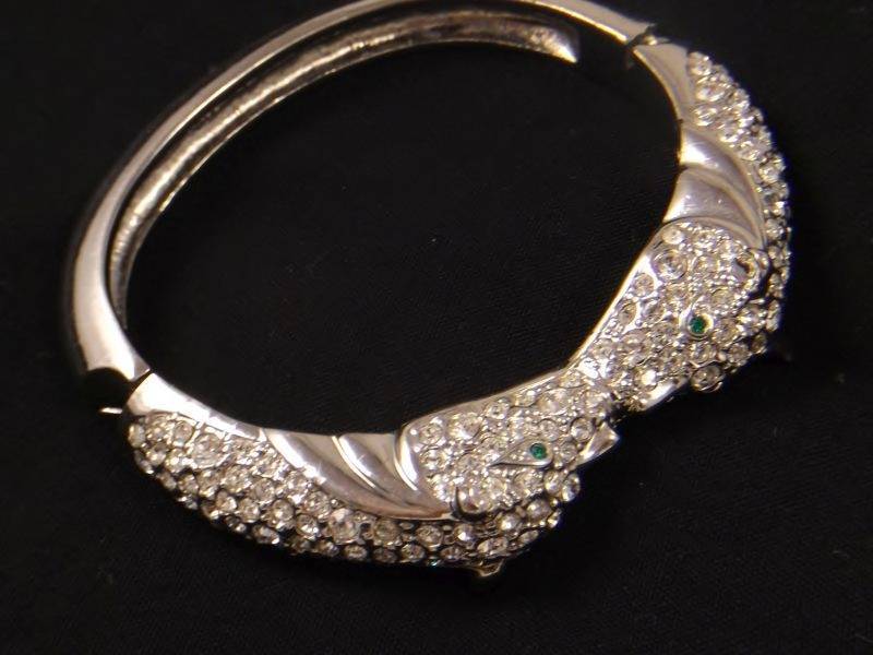 lot 38 image: Silver tone dual Leopard head bracelet