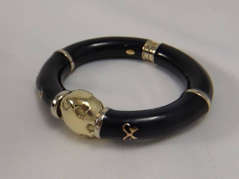 lot 39 image: Ebony & Gold tone bracelet