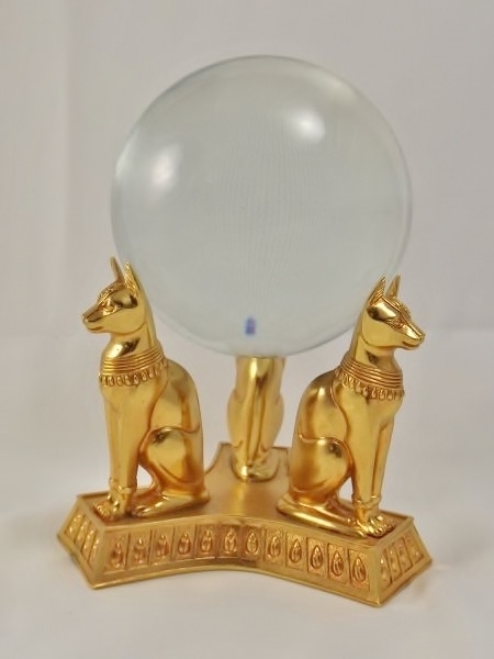 lot 48 image: Egyptian Temple of Bastet solid crystal ball and feline motif stand