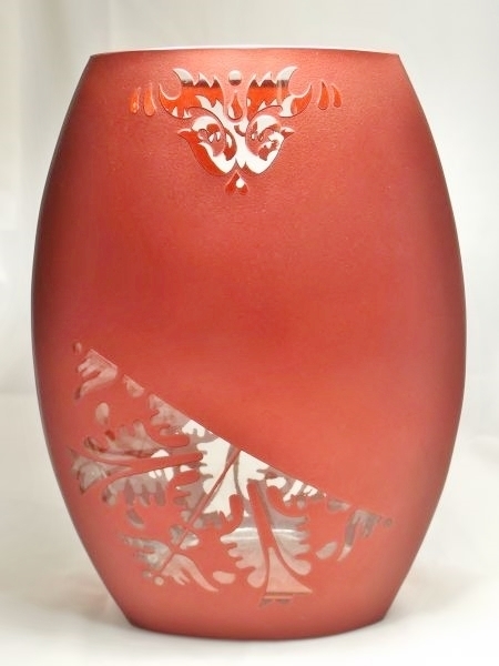 lot 54 image: Pierced red metal vase