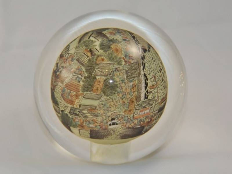 lot 55 image: Asian influenced orb with reverse painted Asian scenesigned by artist