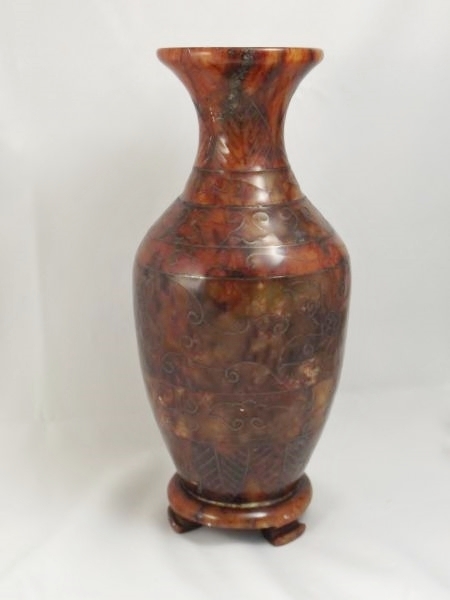 lot 17 image: Red Jade vase purchased in Beijing China