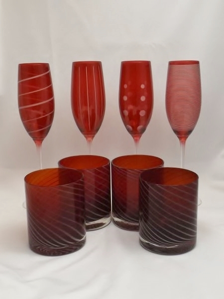 lot 22 image: Mikasa Cheers ruby red champagne flutes and 4 red striped tumblers