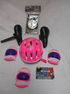 lot 45 image: Bicycle Extras, Including a Bell E.Z. Trainer-Training Wheels, Kids Knee Pads, Kids Helmet,  Bell 12-12 Inner Tube, 2-Seats.