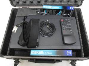 lot 38 image: Symphonic-Model SL240B, Portable, 4-Head  VHS Video Cassette Recorder With Remote And 2-Tapes, In locking Travel Case With Keys