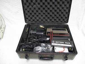 lot 31 image: Vintage General Electric 12-V, VHS MOVIE CAMERA CAMCORDER RECORDER  PLAYER. Model 9-9605