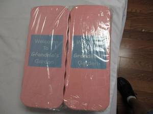 lot 105 image: NEW- 6-Sets (12-Total) Pink-Waterproof EVA Kneeling Pads-Welcome To Grandmas Garden-Printed On One Side- With knock-out for hand Grip