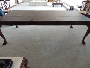 lot 1 image: Stoneleigh Georgian  Regency style dining table with Carved Cabriole Legs terminating with Claw and Ball feet. Has under mount storage drawers and fitted protection pads. 96L x 48W x 36H