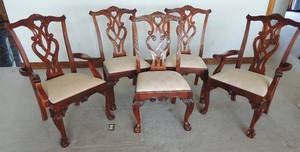 lot 2 image: GeorgianRegency style custom order chairs. Carved pierced scroll back with Cabriole legs terminating with Claw and Ball feet. Upholstered seat. Carved shell apron and scroll accents. 2-Captains chairs with arms and 8 side chairs.