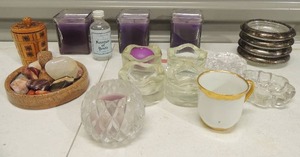 lot 38 image: 4 coasters, 4 glass tea candle holders, 3 purple candles and more