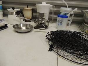 lot 49 image: 4 1801 Revere ware skillet,  Cuisinart covered saucepan, Britta water jug,  Cook mates corning 7 cup coffee maker. 3 tier hanging basket for fruit,  and more