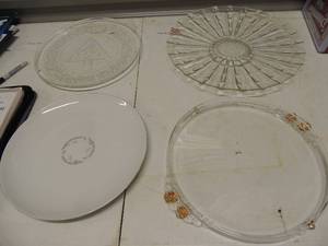 lot 57 image: 4 assorted serving trays- 1 Christmas, 1 glass, 1 gold trim, 1 golden fantasy fire china plate