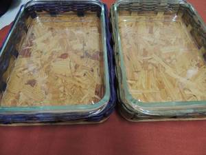 lot 83 image: 2 Pyrex oven  dishes 13x9x2 with wicker holders