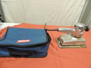 lot 99 image: Black and Decker Sander unknown working order, Ryobi hand drill in case missing battery