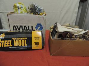 lot 101 image: Box of steel wool and box of work gloves