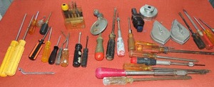 lot 11 image: Large lot of screw drivers, chalk line x 2, mini screw drivers and more