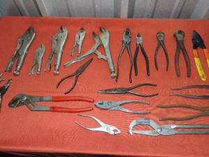 lot 12 image: Lot of plyers, channel locks, needle nose, wire cutters, nips and more