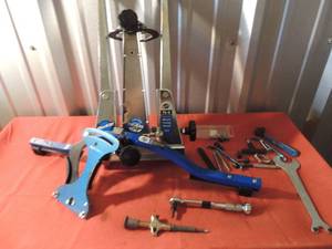 lot 115 image: Park Tool TS-2 Professional Bicycle Wheel Truing Stand and other cycle items, alignment gauge