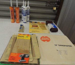 lot 119 image: 2 new tubes  of master seal-   3 new tubes of birdx transparent repellant   large lot of sandpaper new and used
