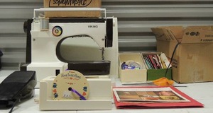 lot 120 image: Viking sewing machine (works great) all manuals included. Sewing thread, needles patterns, and more