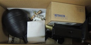lot 121 image: Box of Kohler toilet accessories seem to be new
