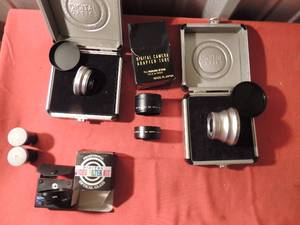 lot 134 image: 2 digital optical camera lenses, digital camera adapter tube in box, video filter kit for digital camera 2 rolls of film