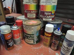 lot 145 image: Assorted used cans of paint and clear coat finish. Spray cans of enamel and spray paint in blue bucket