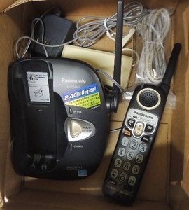 lot 147 image: Panasonic home phone system used, charger and base included