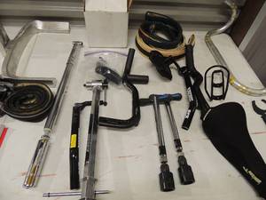 lot 169 image: Bike lot- tubes, pumps, handlebars, seats and more