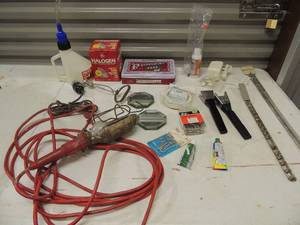 lot 172 image: Crack sealer hanging light, halogen light replacement 2 handles, C hooks and more