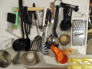 lot 176 image: Kitchen lot- flatwear, cheese grater, ladles, top boiler and 3 tromortira sauce pans