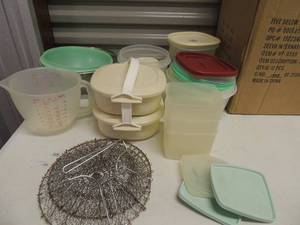 lot 188 image: Large box of assorted Tupperware most have lids, 2 wire baskets strainers and large measuring cup