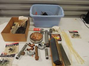 lot 226 image: Blue tub of pipe fittings staples, zip ties and more