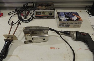 lot 227 image: 7 Range AC volt ohmmeter in original box   2 ways for cable split   Black & decker industrial electric drill, skillsaw, Schumacher battery charger