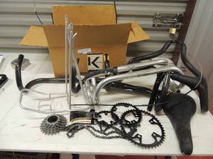 lot 236 image: Bicycle parts-handle bars, seats, chains and pullies