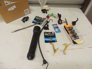 lot 237 image: Flashlight, batteries, shelving, plugs, Velcro