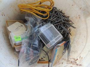 lot 255 image: White bucket of large size nails