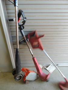 lot 265 image: Toro electric weed eaters x 2 and Black and Decker edger