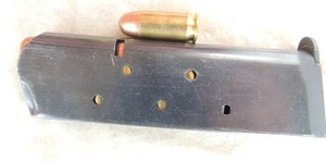 lot 30 image: Colt 45 Auto Magazine  has 7 bullets Federal