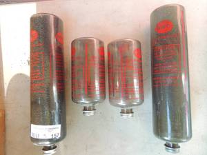 lot 157 image: MEC shot reloading containers, 12 containers 1 has 9 shot 1 has 6 shot and 2  5 containers