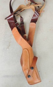 lot 289 image: Smith and Wesson leather holster with straps 23  34