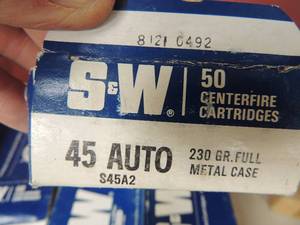 lot 291 image: Smith & Wesson 45 auto casing 5 12 Boxes (open)